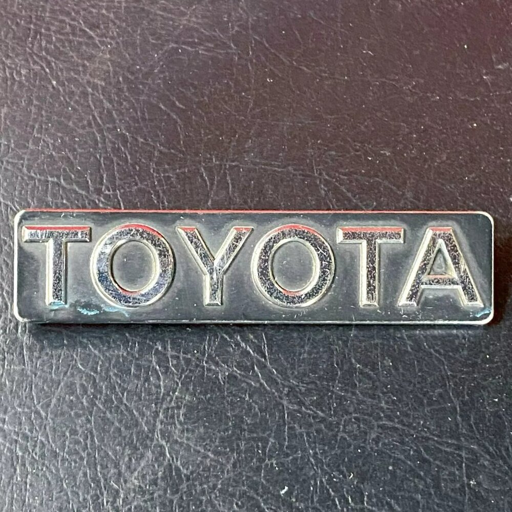 Original Toyota Chrome Emblem 3” L x 3/4” H